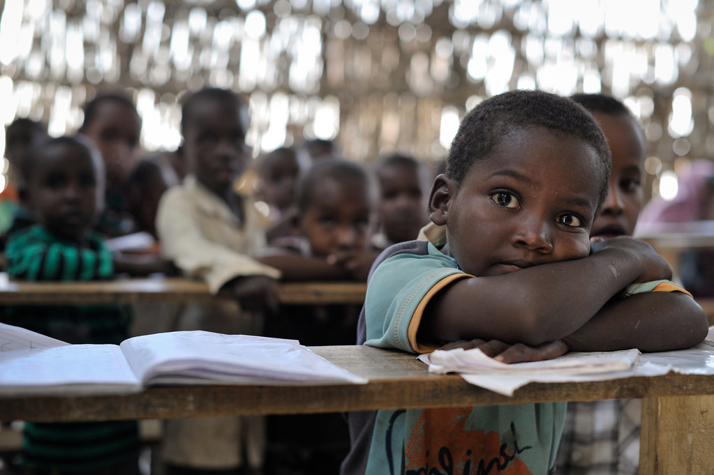 Teacher with students in classroom